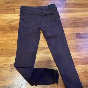 Maroon/purple skinny jeans. Low rise
